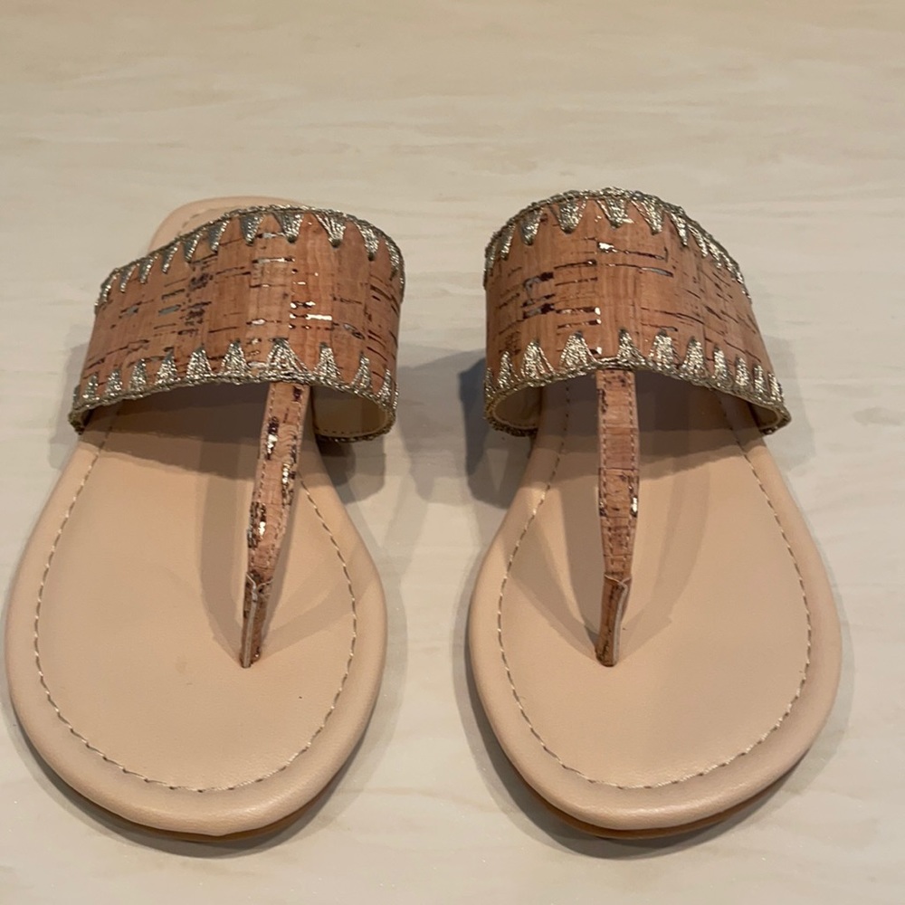 Flat sandals.